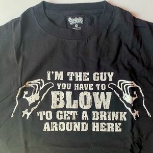 Off-color pun graphic tee. “U’m the guy you have to xxxx to get a drink….”